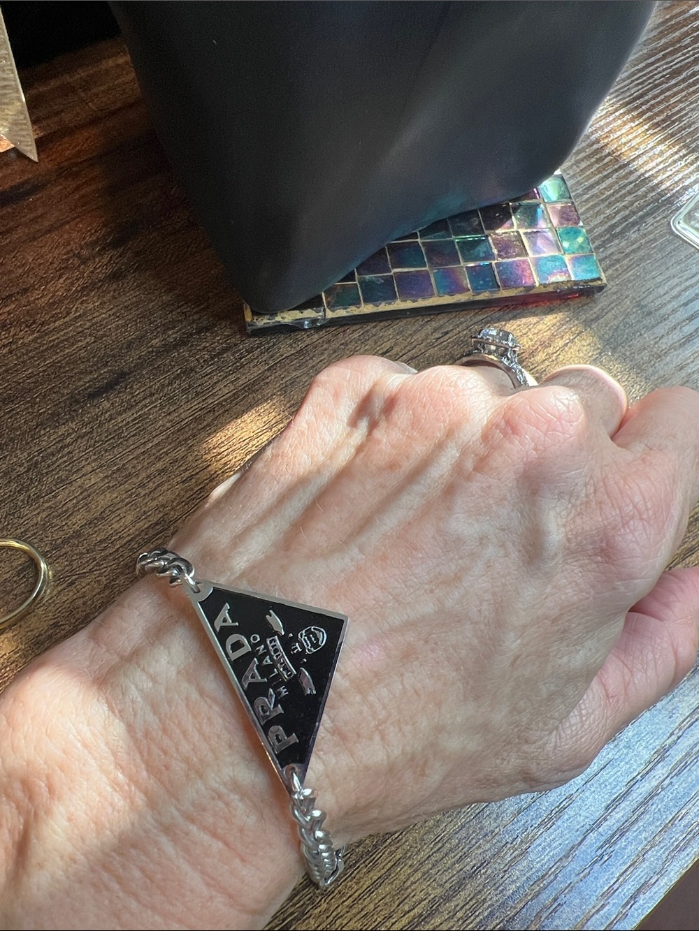 Silver and  Black Triangle Logo Chain Bracelet